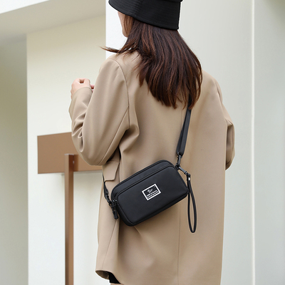 驰豹手机包女横款轻便