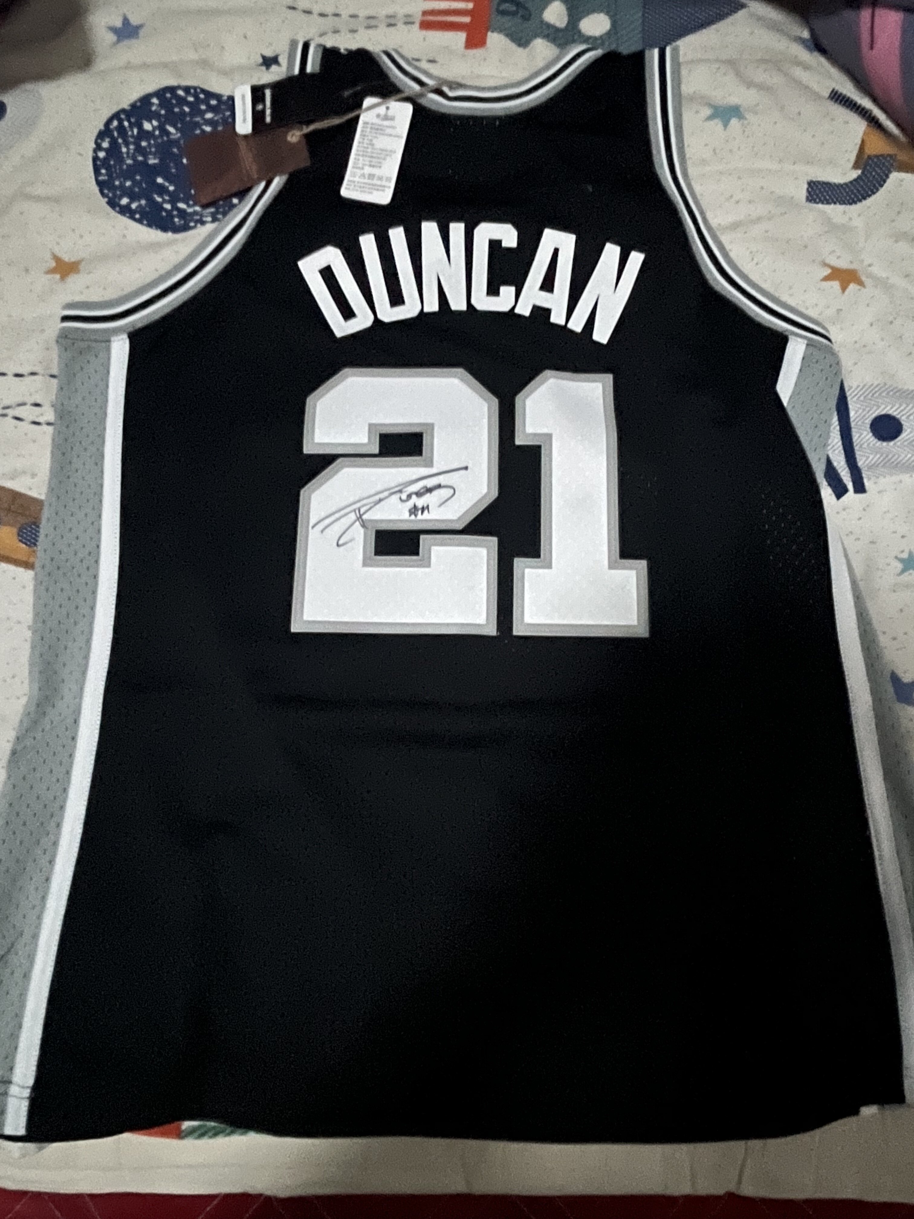 蒂姆邓肯亲笔签名球衣 马刺石佛