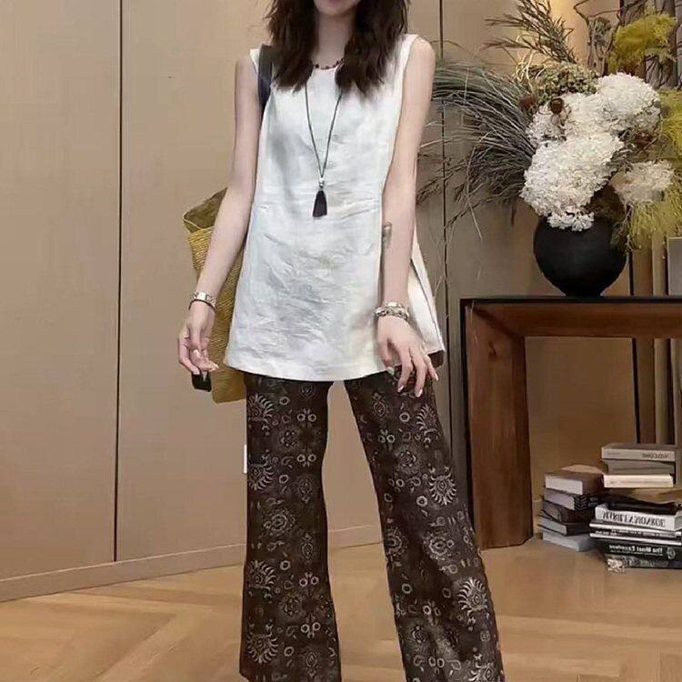 韩式显新款瘦棉麻无袖衬衫碎花微喇九分裤两件套女2026宽松一套