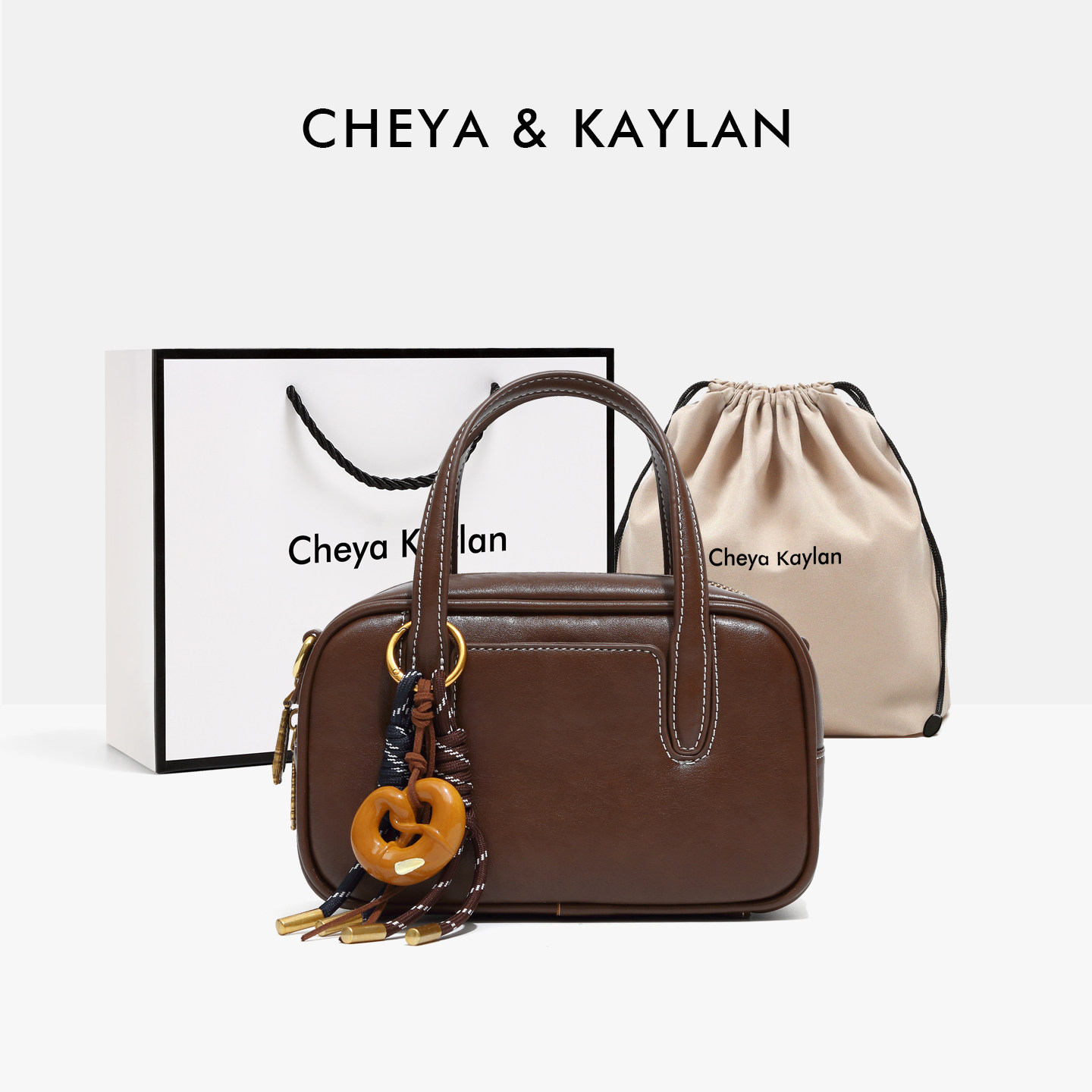 CheyaKaylan方糖保龄球包女2026新款牛皮波士顿包手提单肩斜挎包,箱包皮具/热销女包/男包,小方包,淘宝优惠券,粉丝福利购,淘宝优惠卷