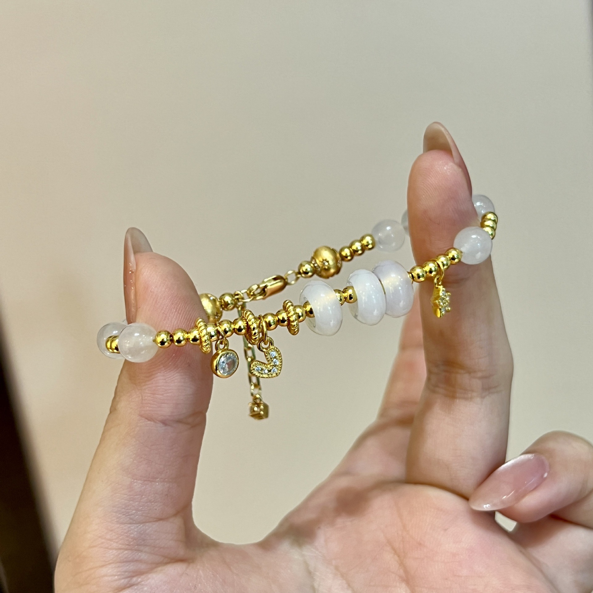 SSJEWELRY轻奢珠宝白玉髓平安扣跑环手链S925银镀金星芒圆珠手饰