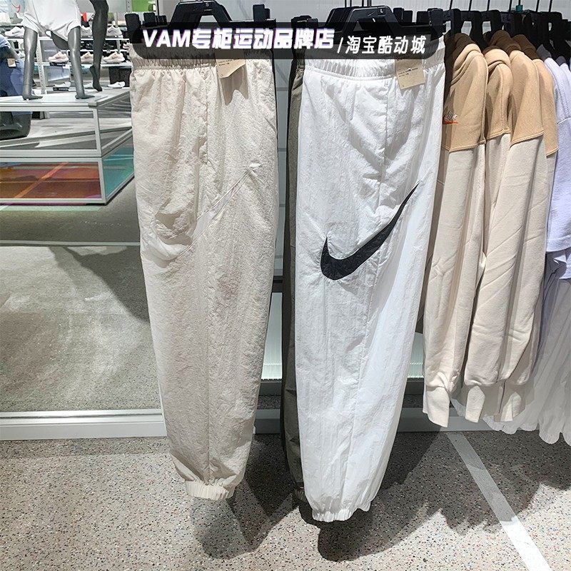 Nike耐克女子2023春秋季新款大勾梭织运动休闲收口长裤DM6184-100