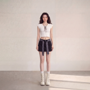艾格美式 休闲短裙少女辣妹风百搭小黑裙 复古A字半身裙女2026春季