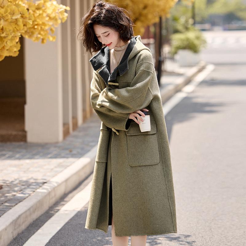时尚半261气质松连帽双宽羊毛面大衣女秋冬新款古牛复角扣长款毛