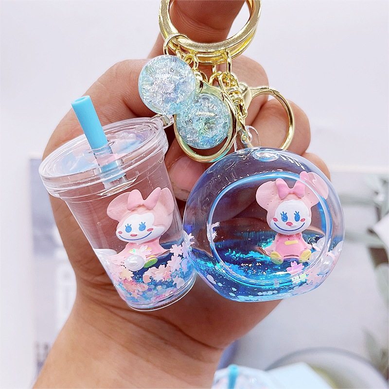 入油创意棒棒糖钥匙扣液体流沙小丑米妮挂件精致包包配饰礼品