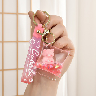 新款爆闪叠叠乐漂浮入油瓶挂件亚克力配件创意熊猫流沙瓶包包挂饰