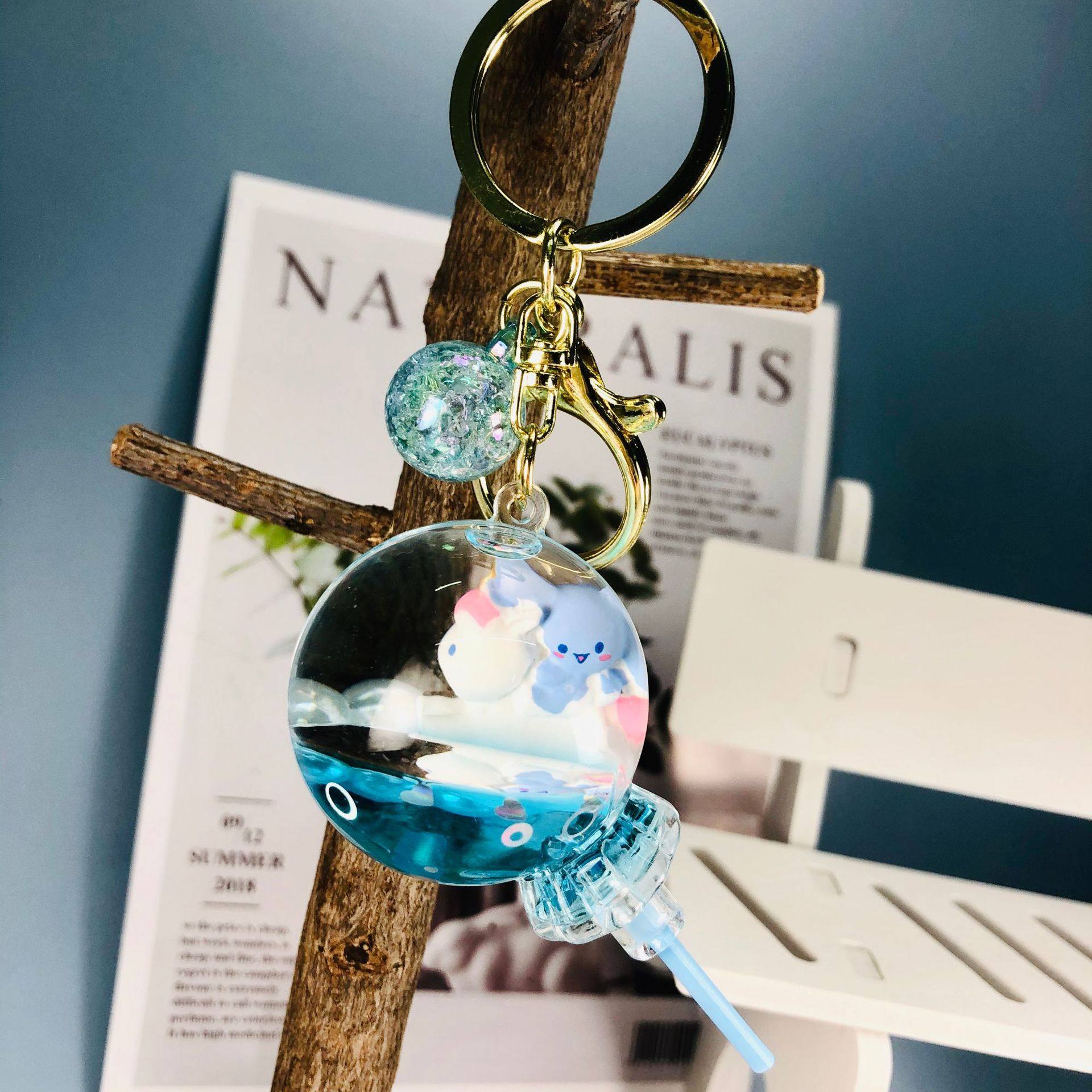 新款可爱卡通入油棒棒糖布丁狗漂浮瓶钥匙扣男女流沙钥匙挂件