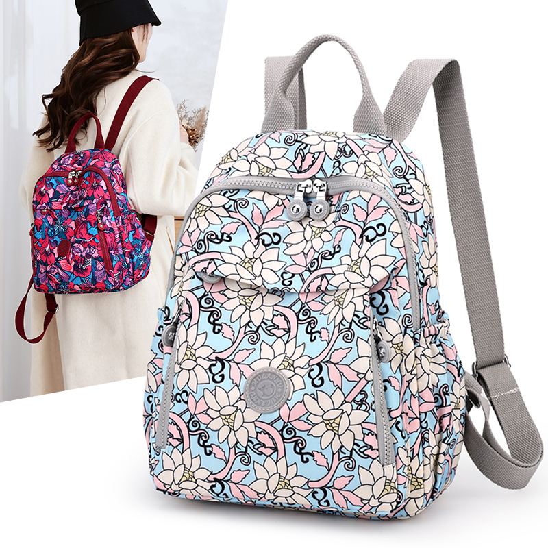 中年女士妈妈轻便简约印花民族风帆布双肩包旅行通勤背包防水书包