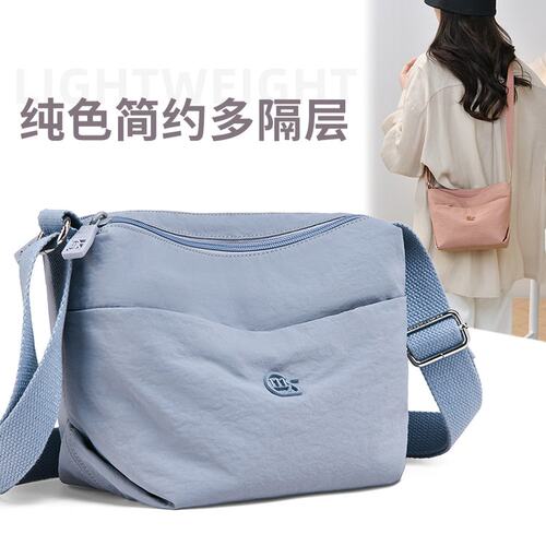 新款妈妈斜挎包轻便防水牛津布帆布女包中老年休闲运动尼龙背包小