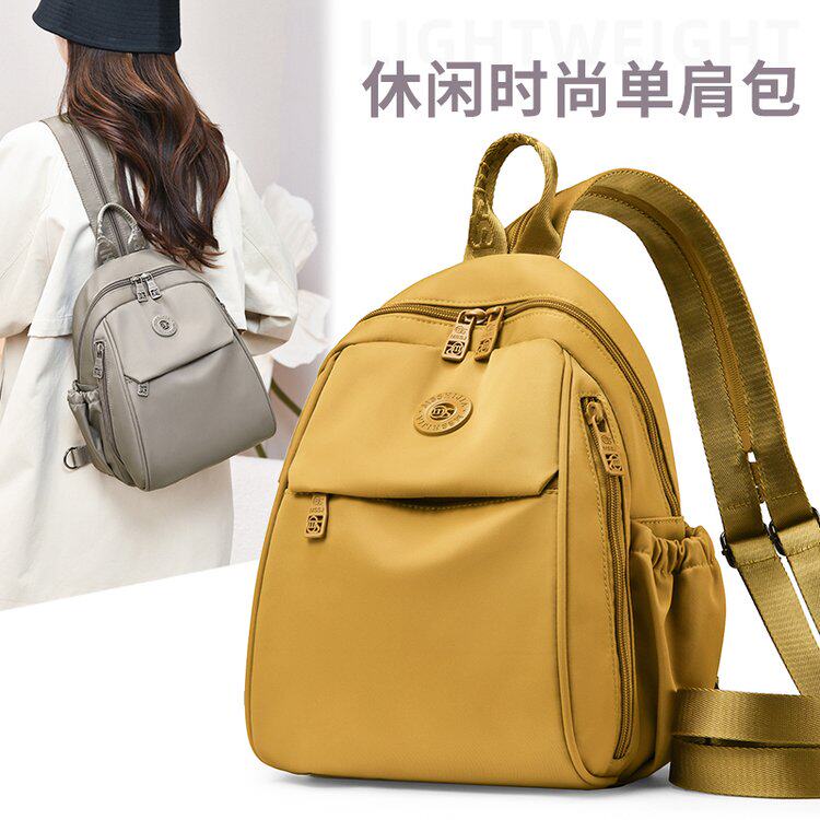 多用双肩包女士2025新款牛津布百搭户外登山旅游通勤小型背包斜挎