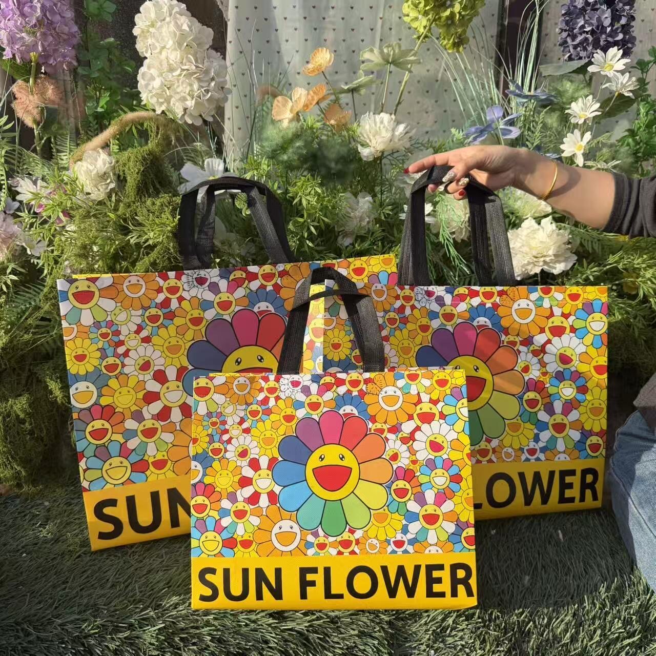 向阳花覆膜防水无纺布卡通服装店童装店袋子环保袋时尚购物袋定制