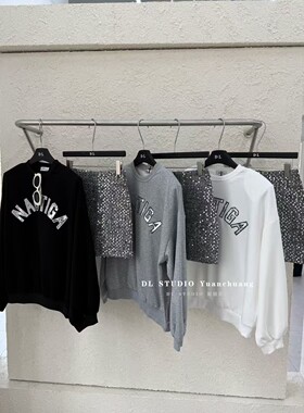 欧洲站2026春季新款韩版时尚气质卫衣上衣+亮片短裙两件套A10012