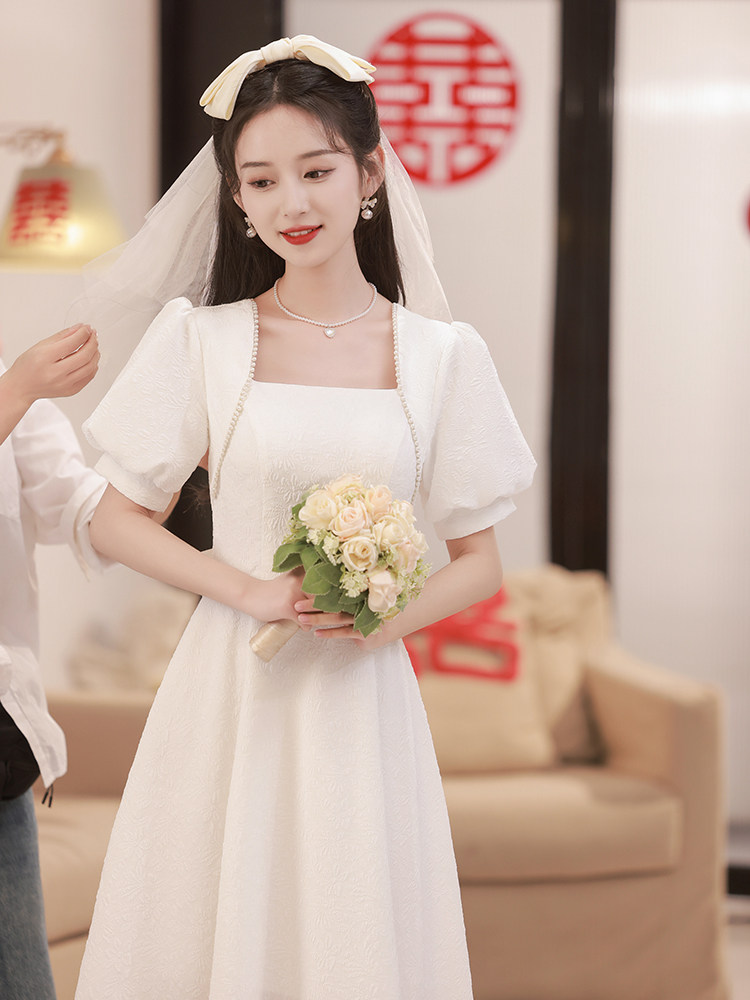 白色晚礼服裙女2026新款轻奢小众高端气质名媛宴会主持人连衣裙子