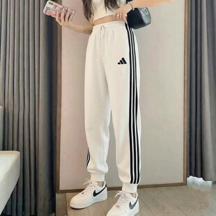阿迪达斯白色运动裤女裤秋季新款休闲裤针织宽松三条纹小脚裤长裤