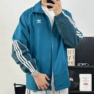 阿迪达斯三叶草外套男春季新款蓝色梭织运动服宽松撞色夹克防风衣