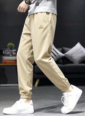 阿迪达斯运动裤男裤夏季休闲裤梭织快干透气束脚小脚裤卡其色长裤