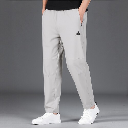 阿迪达斯薄款透气运动裤男裤休闲裤梭织透气直筒小脚锥形九分裤