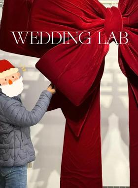 巨型红色圣诞蝴蝶结装饰婚礼艺术装饰橱窗陈列商业美陈场景布置