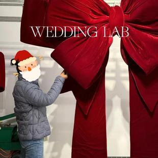 巨型红色圣诞蝴蝶结装 饰橱窗陈列商业美陈场景布置 饰婚礼艺术装