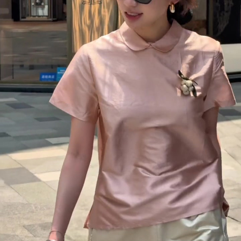 韩系高级感气质后背纽扣娃娃领短袖衬衫女2026新款夏季翻领上衣潮