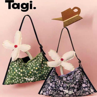 Tagi.边边提花大容量通勤斜挎包