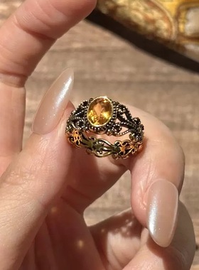 民族风镂空黑金做旧黄钻蛋面戒指