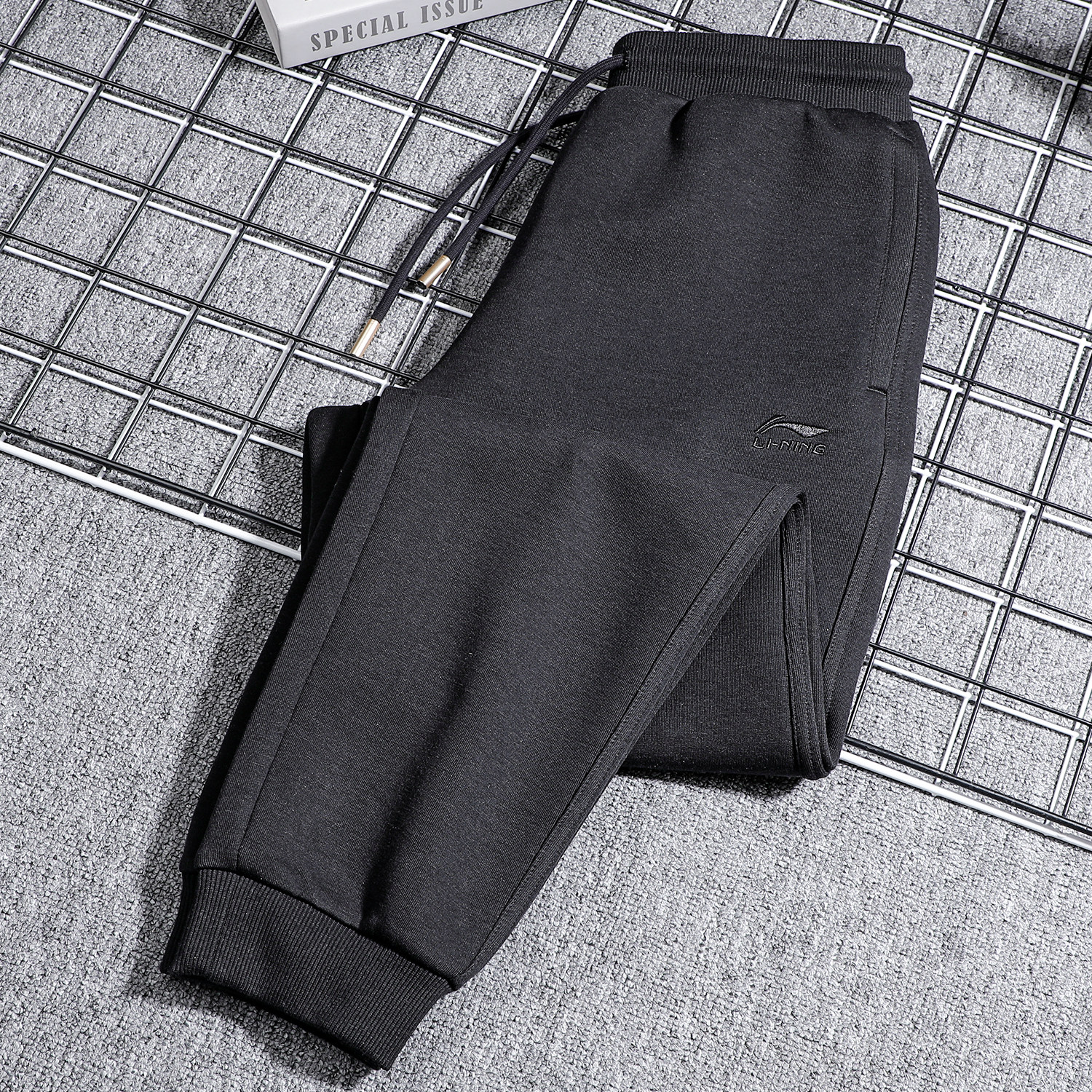 李宁束脚运动长裤男款2025春季新款时尚针织运动黑色卫裤AKLV097