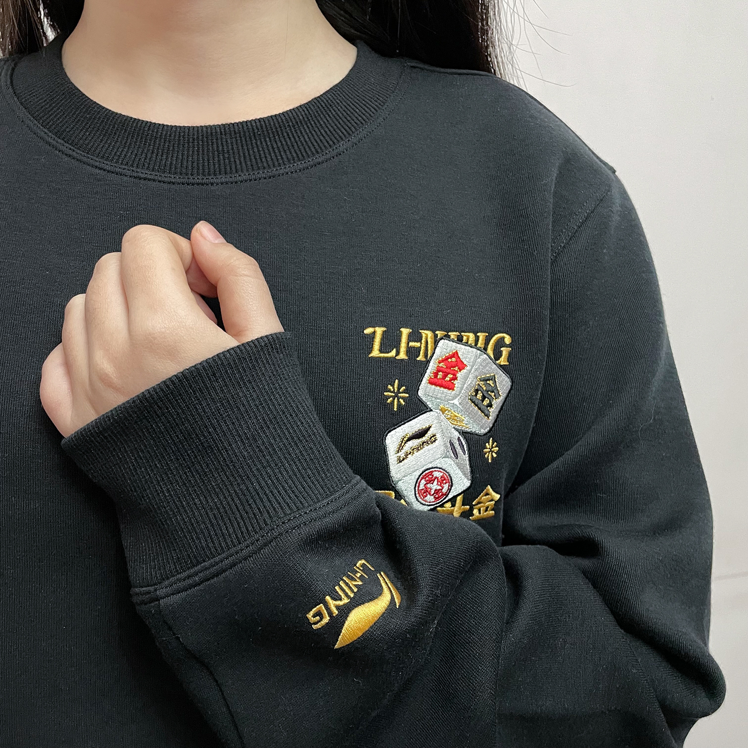 李宁卫衣男女同款2025春季新款日进斗金运动无帽黑色上衣AWDV165