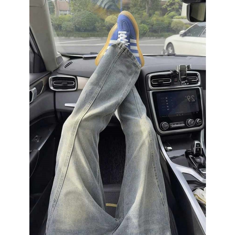 复古蓝斜切微喇牛仔裤男秋季