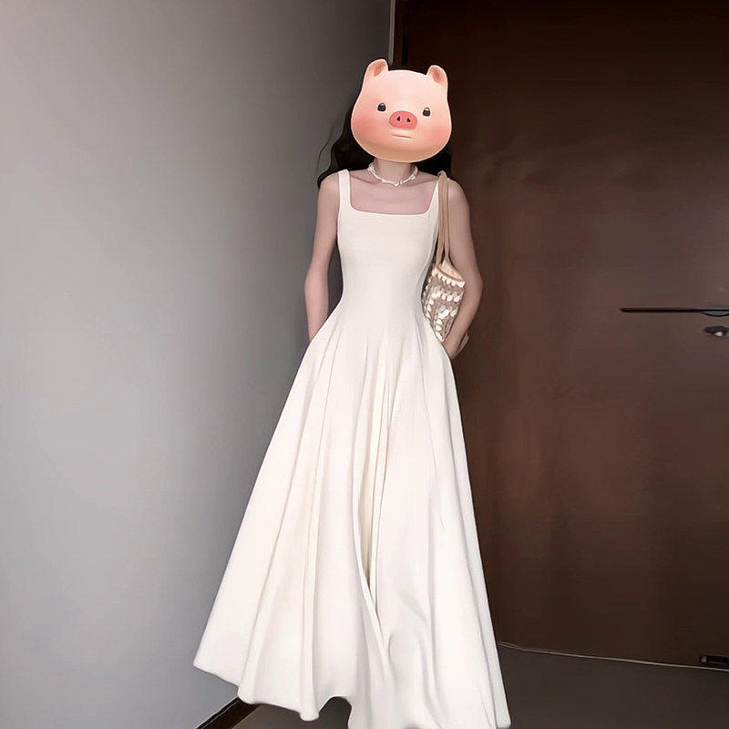 白色吊带洋装子女夏季法式气质小个子高级感收腰显瘦小白裙长裙