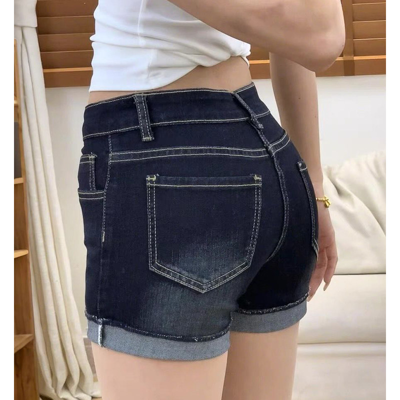 美式深蓝色牛仔短裤女2026夏季新款显瘦辣妹低腰包臀a字卷边热裤