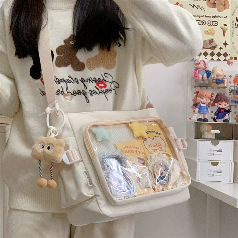 学院风百搭简约大容量邮差包女透明吧唧单肩包斜挎娃包痛包