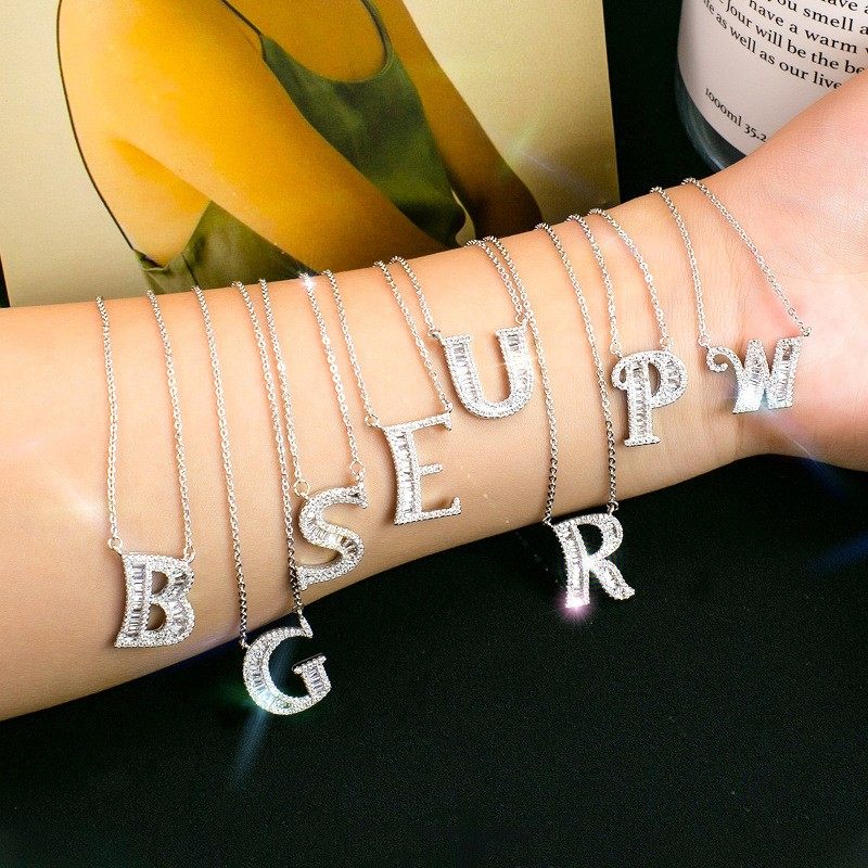 PT950铂金新款莫桑石满钻排钻26字母吊坠情侣轻奢项链纯银时尚