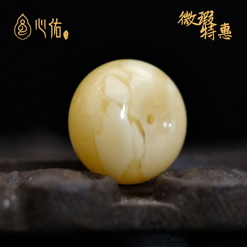 心佑瑕疵蜜蜡墩子隔珠配饰保真