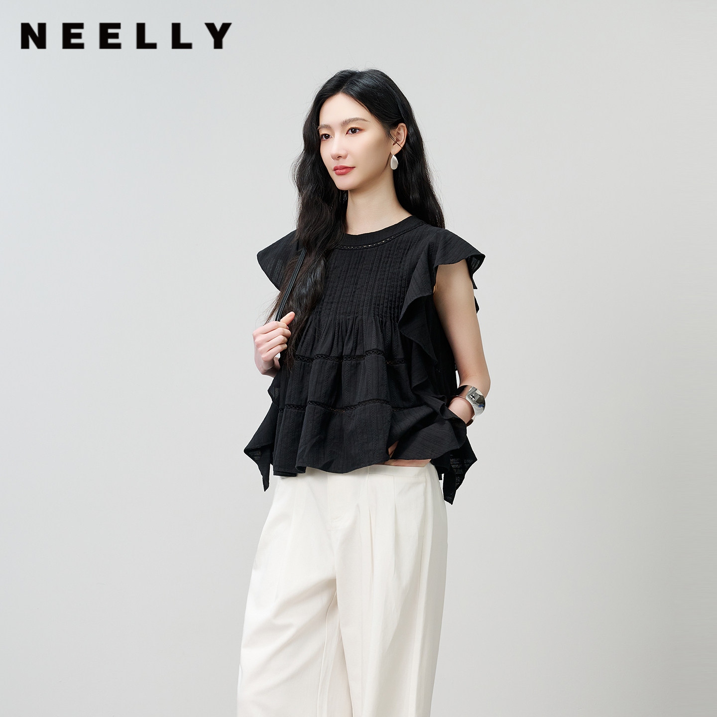 NEELLY纳俪商场同款夏季新款法式荷叶边无袖娃娃衫女宽松亲肤上衣