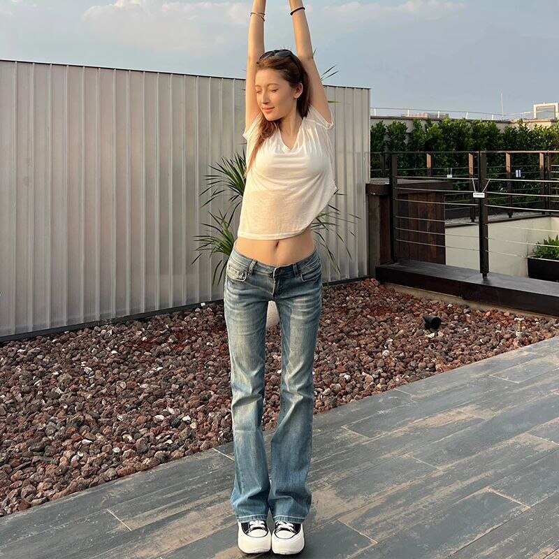 复古窄版猫爪微喇牛仔裤女2026秋冬季新款低腰显瘦修身弹力喇叭裤