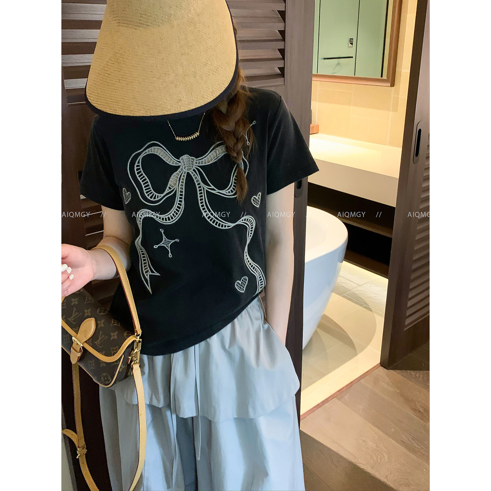 爱情魔鬼鱼 设计感短袖圆领蝴蝶结镂空T恤女2026夏季新款时尚上衣