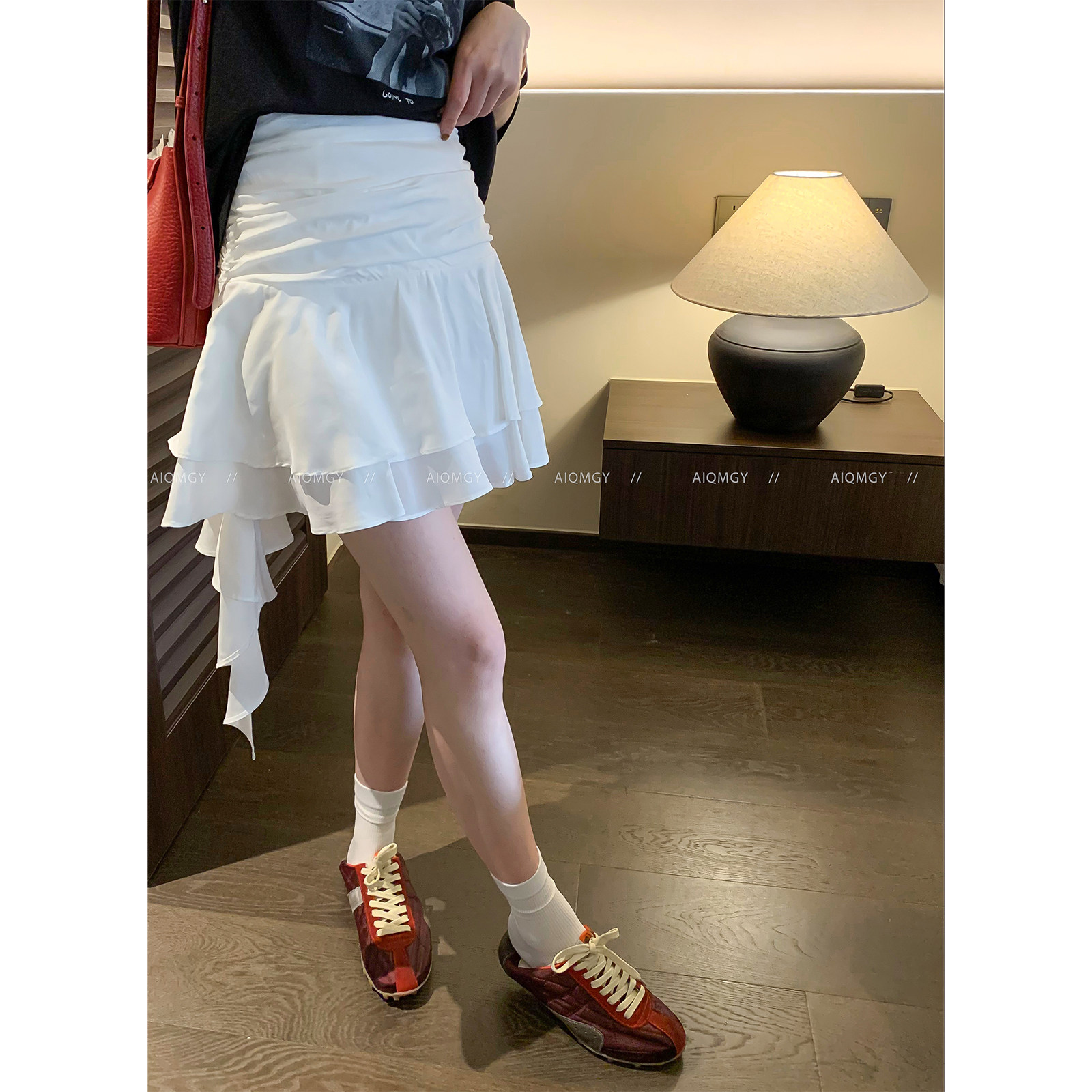 爱情魔鬼鱼 纯色荷叶边不规则天丝半身裙女2026夏季设计感短裙子