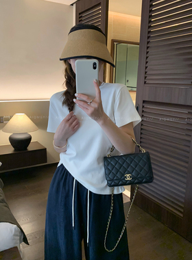 爱情魔鬼鱼 白色短袖圆领后背扣子镂空修身T恤女2026夏季新款上衣