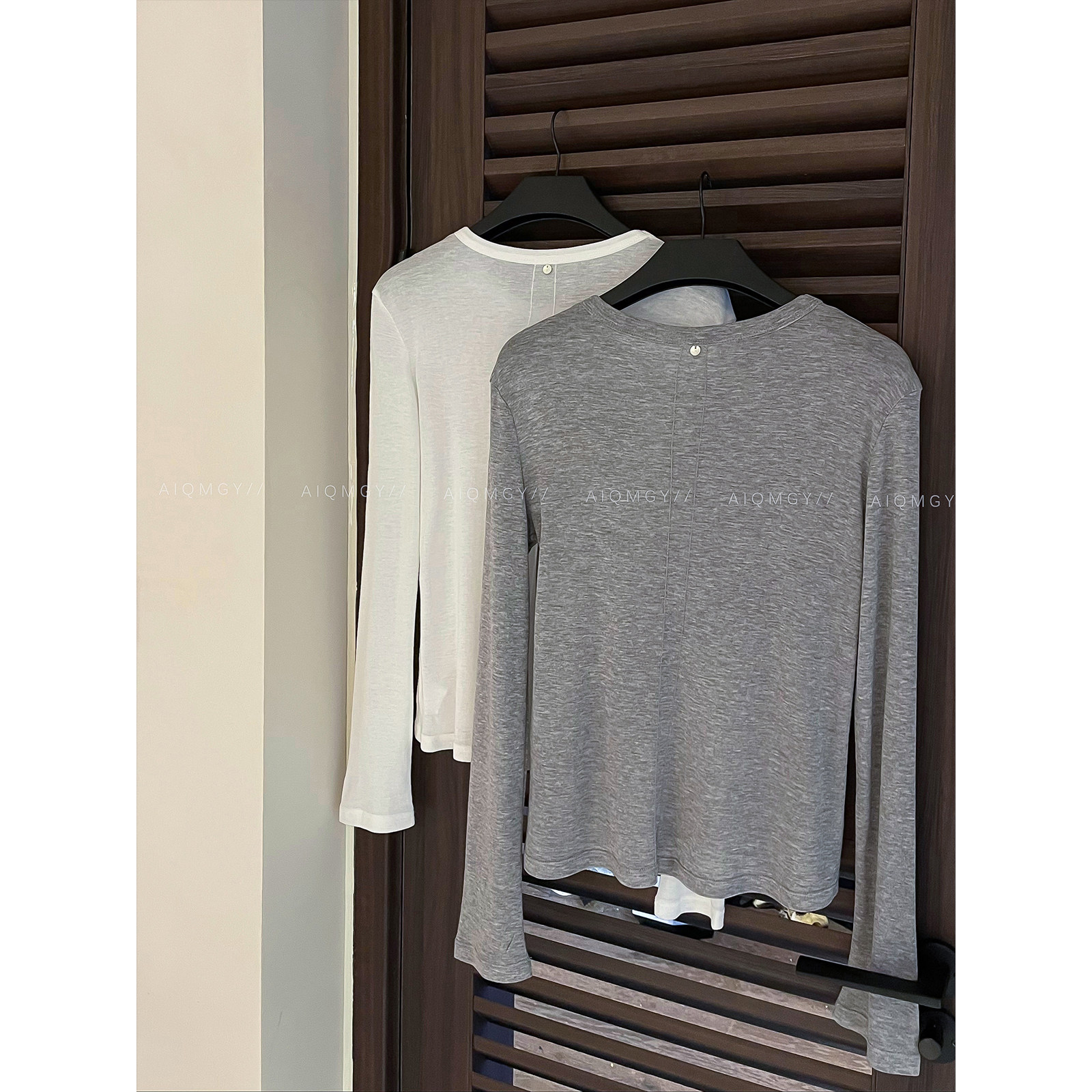 爱情魔鬼鱼 纯色长袖圆领天丝羊毛T恤女2026春季新款简约百搭上衣