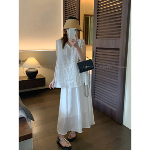 爱情魔鬼鱼 苎麻套装女2026夏季新款木耳边无袖衬衫半身裙两件套