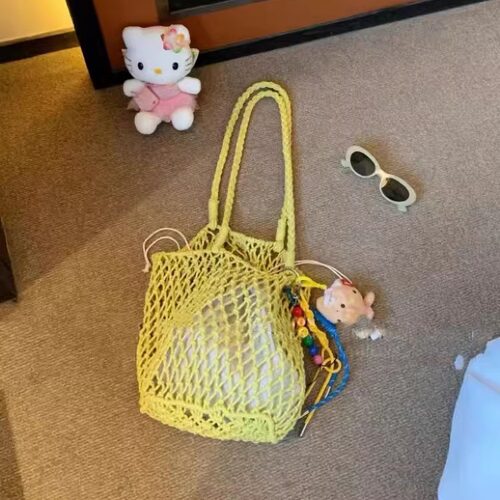 秦岚同款大容量网兜手提单肩包小众设计镂空编织沙滩包女通勤包