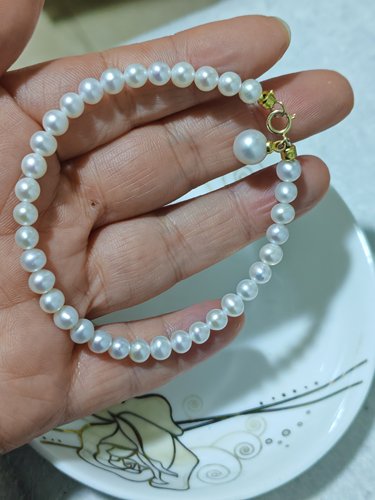 天然淡水珍珠手链极光近正圆新款轻奢小众弹力绳珍珠手串叠戴