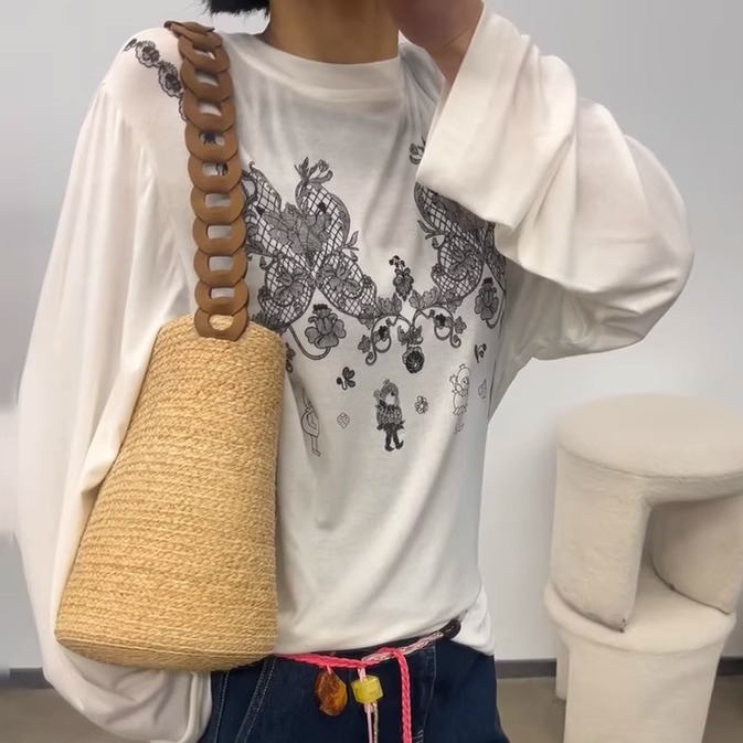 小众设计单肩腋下包包草编水桶包简约风编织包通勤女包2025春夏新