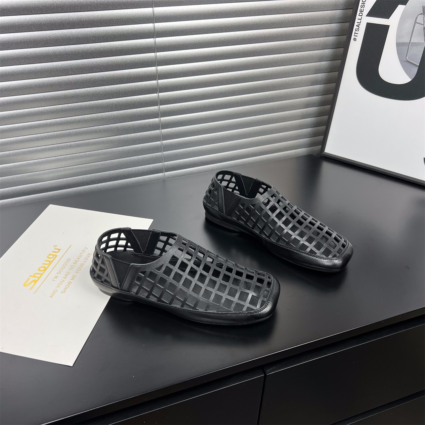 小众镂空编织羊皮包头凉鞋女2026夏新款韩版透气平底黑色休闲单鞋