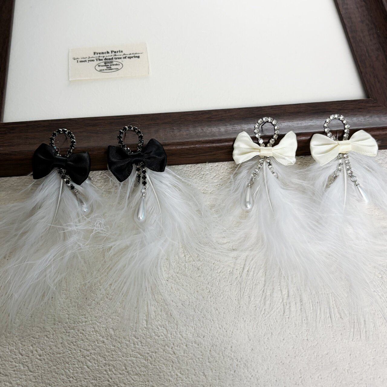 优雅羽毛镶钻蝴蝶结珍珠流苏耳环甜美淑女少女感个性夸张耳饰新款