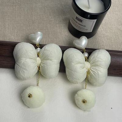 甜美气质蓬蓬立体蝴蝶结毛球耳环个性夸张轻奢高级时髦小众耳饰女