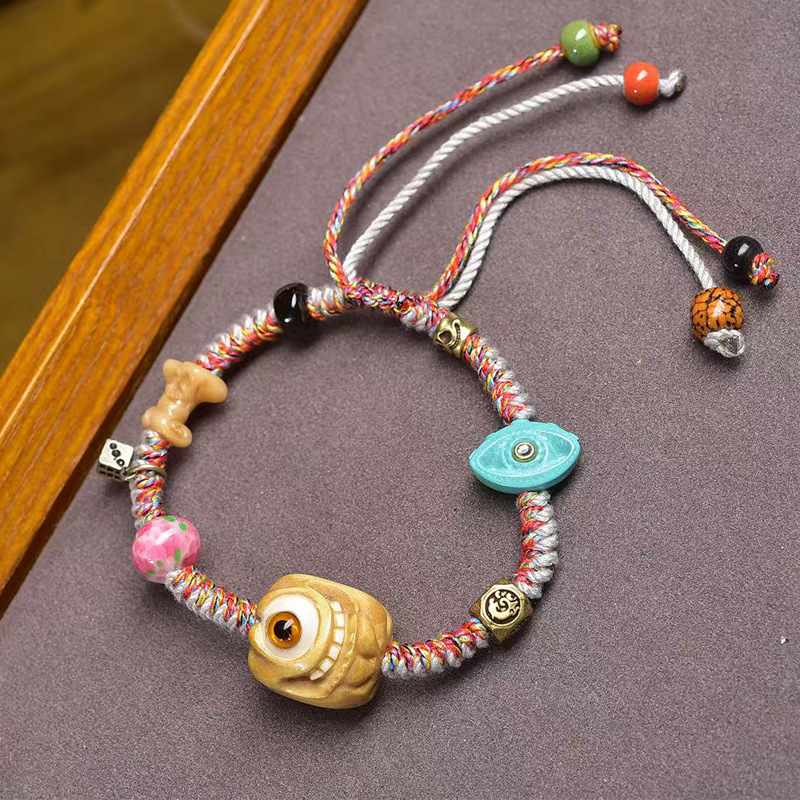 天然根付彩绘雕刻小丑独眼怪编织绳手链牦牛骨料器菩提配饰手绳
