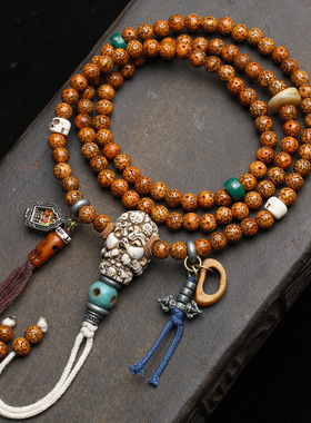 藏区天然开片包浆元宝籽星月菩提108颗佛珠念珠根付三通盘玩饰品