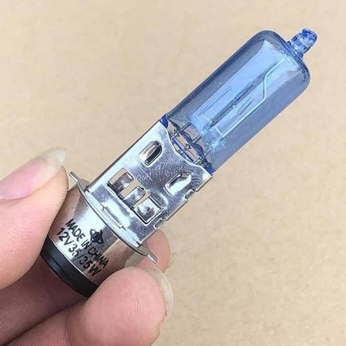新款摩托车通用前大灯超亮灯泡双爪12V疝气灯泡白光款35W一体灯光
